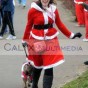 Hannah Golding Miss Swindon finishes the Santa Run at Coate Water Swindon